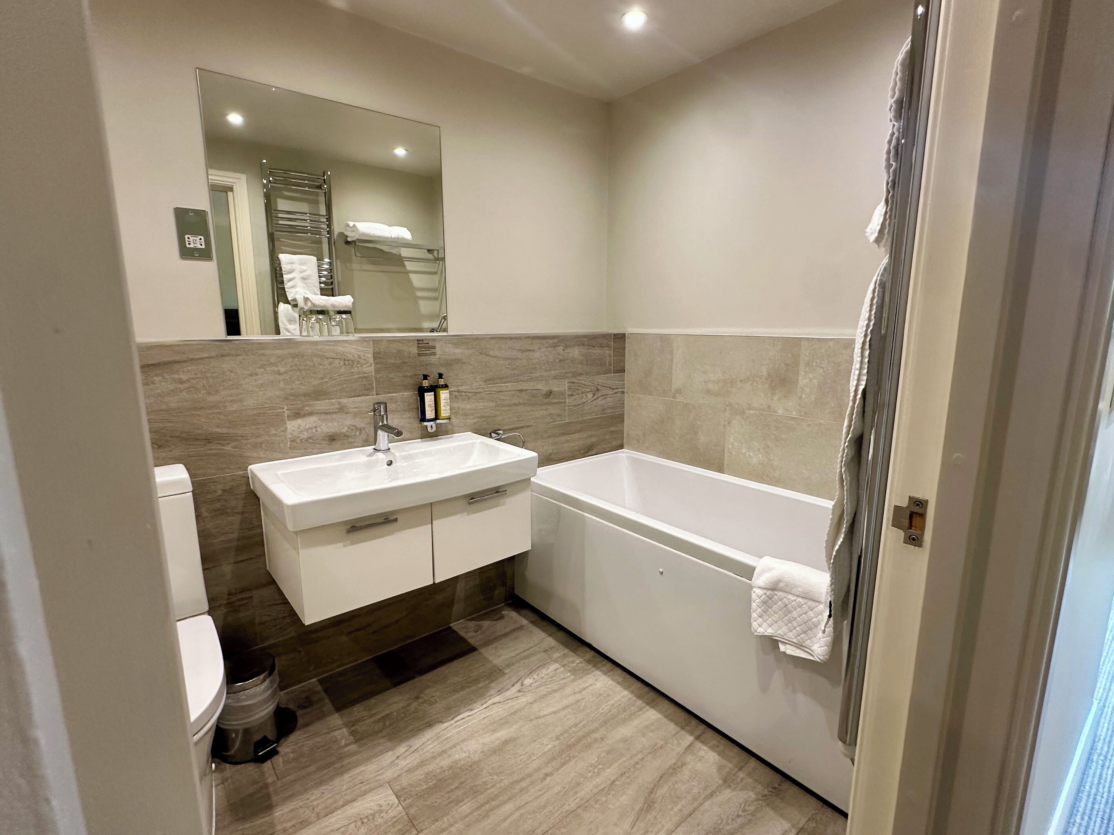 family room | bathroom | combined shower/bathtub, free toiletries, hair dryer, towels