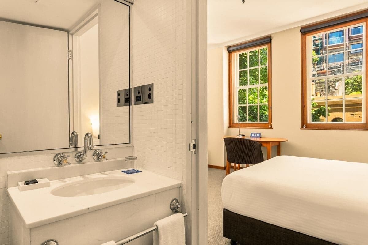 superior king | bathroom | combined shower/bathtub, eco-friendly toiletries, hair dryer, towels
