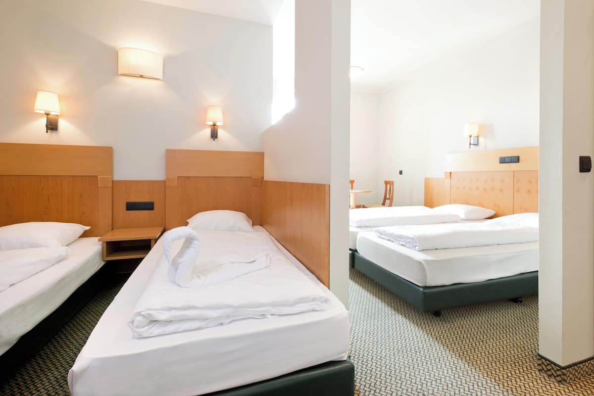 Desk, laptop workspace, free WiFi, bed sheets