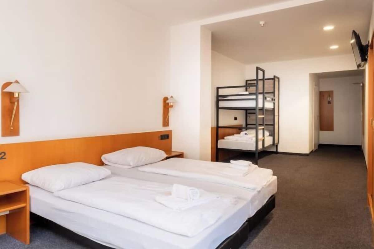 Desk, laptop workspace, free WiFi, bed sheets