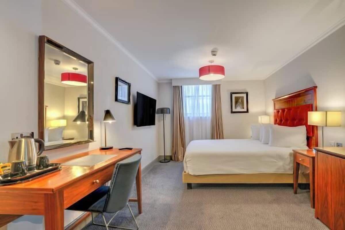 In-room safe, desk, blackout curtains, iron/ironing board