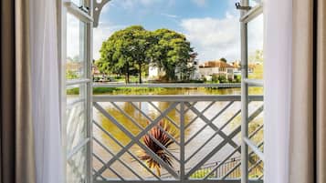 Room, 2 Twin Beds, River View | In-room safe, desk, blackout drapes, iron/ironing board