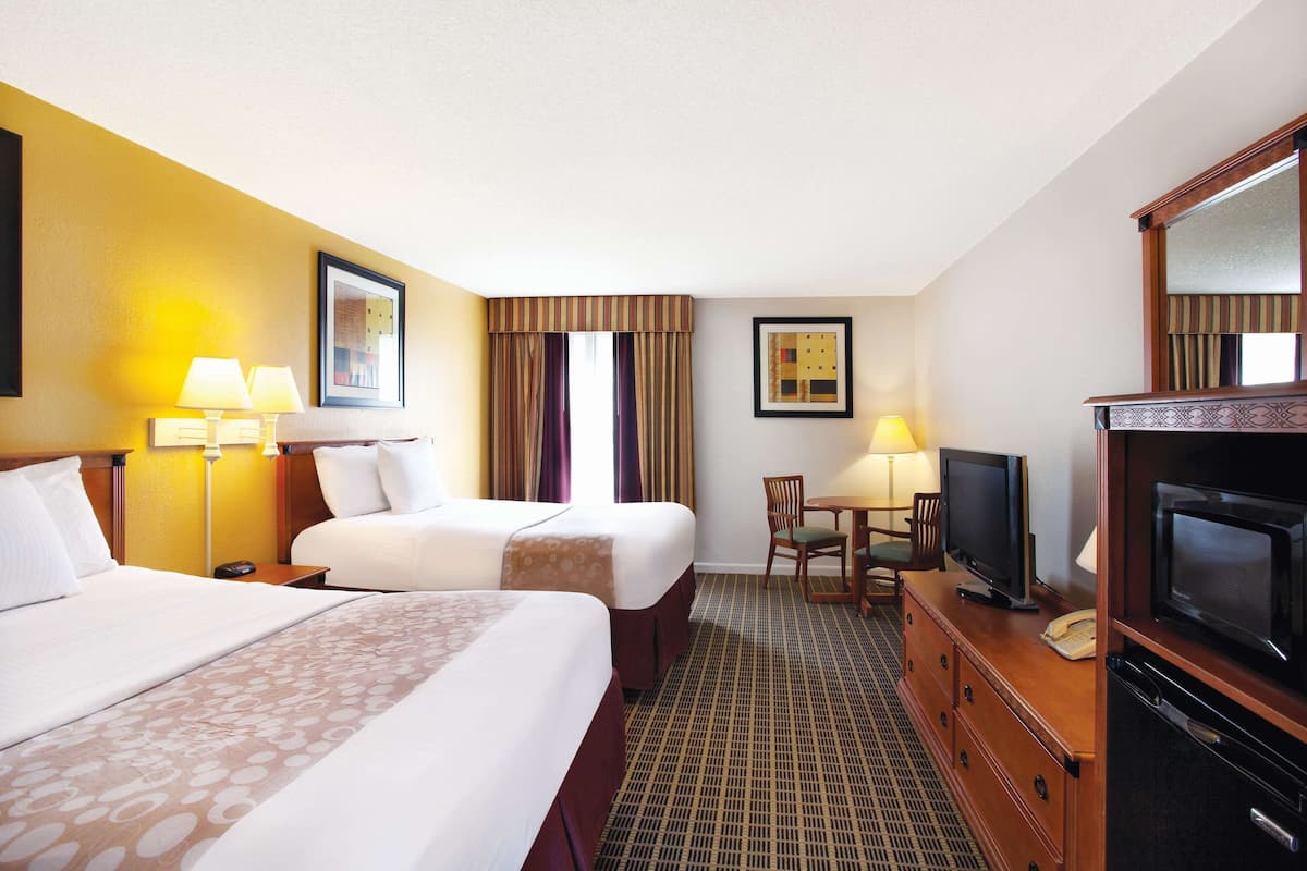 Room, 2 Queen Beds, Non Smoking | In-room safe, laptop workspace, iron/ironing board, free WiFi