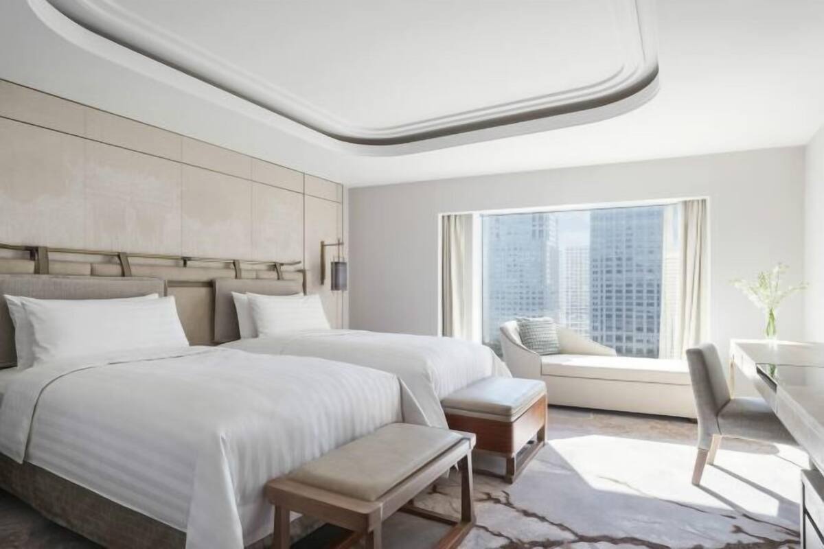 Select Comfort beds, minibar, in-room safe, desk