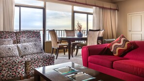 Suite, 1 King Bed, Ocean View | In-room safe, desk, iron/ironing board, free cots/infant beds