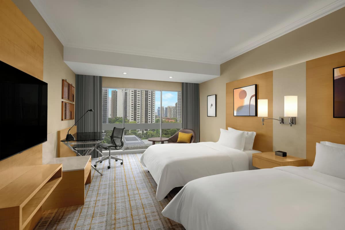 Premium bedding, down comforters, minibar, in-room safe