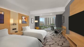 Ropa de cama de alta calidad, cubrecamas y minibar