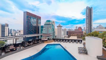 Outdoor pool, free pool cabanas, pool umbrellas
