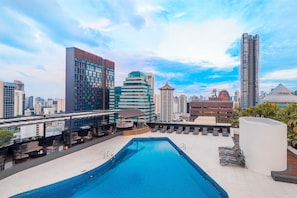 Outdoor pool, free pool cabanas, pool umbrellas