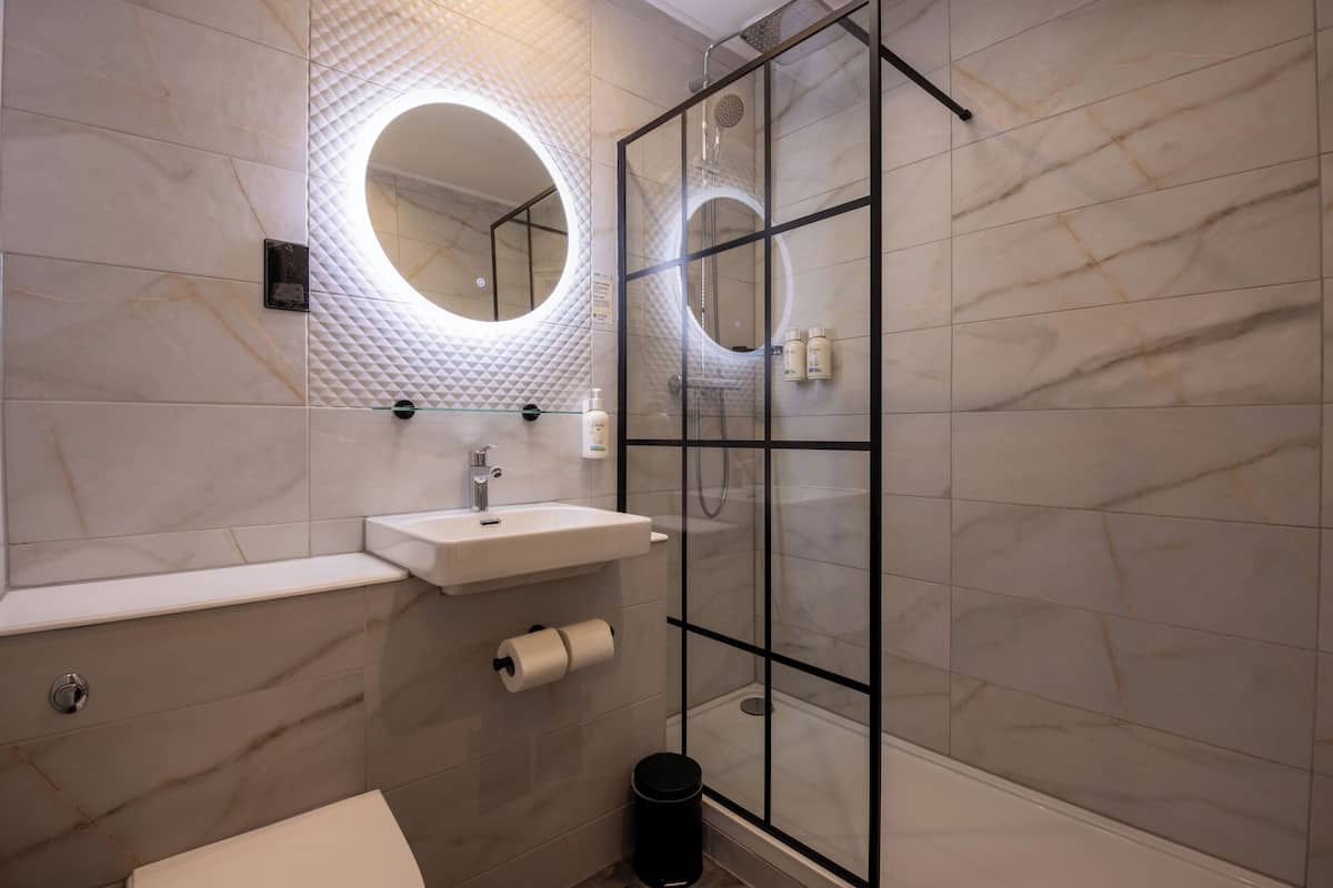 Eco-friendly toiletries, hair dryer, towels