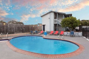 Seasonal outdoor pool, pool loungers