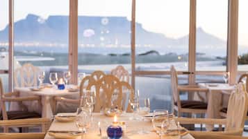 Breakfast, lunch, dinner served; beach views
