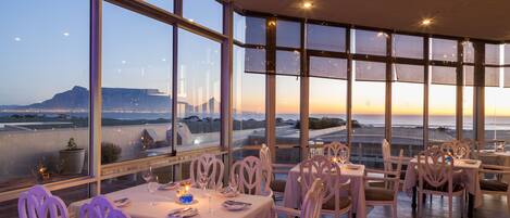 Breakfast, lunch, dinner served; beach views