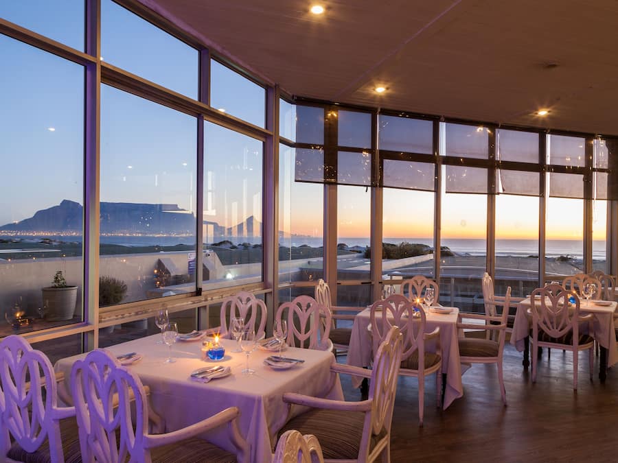 Breakfast, lunch, dinner served; beach views