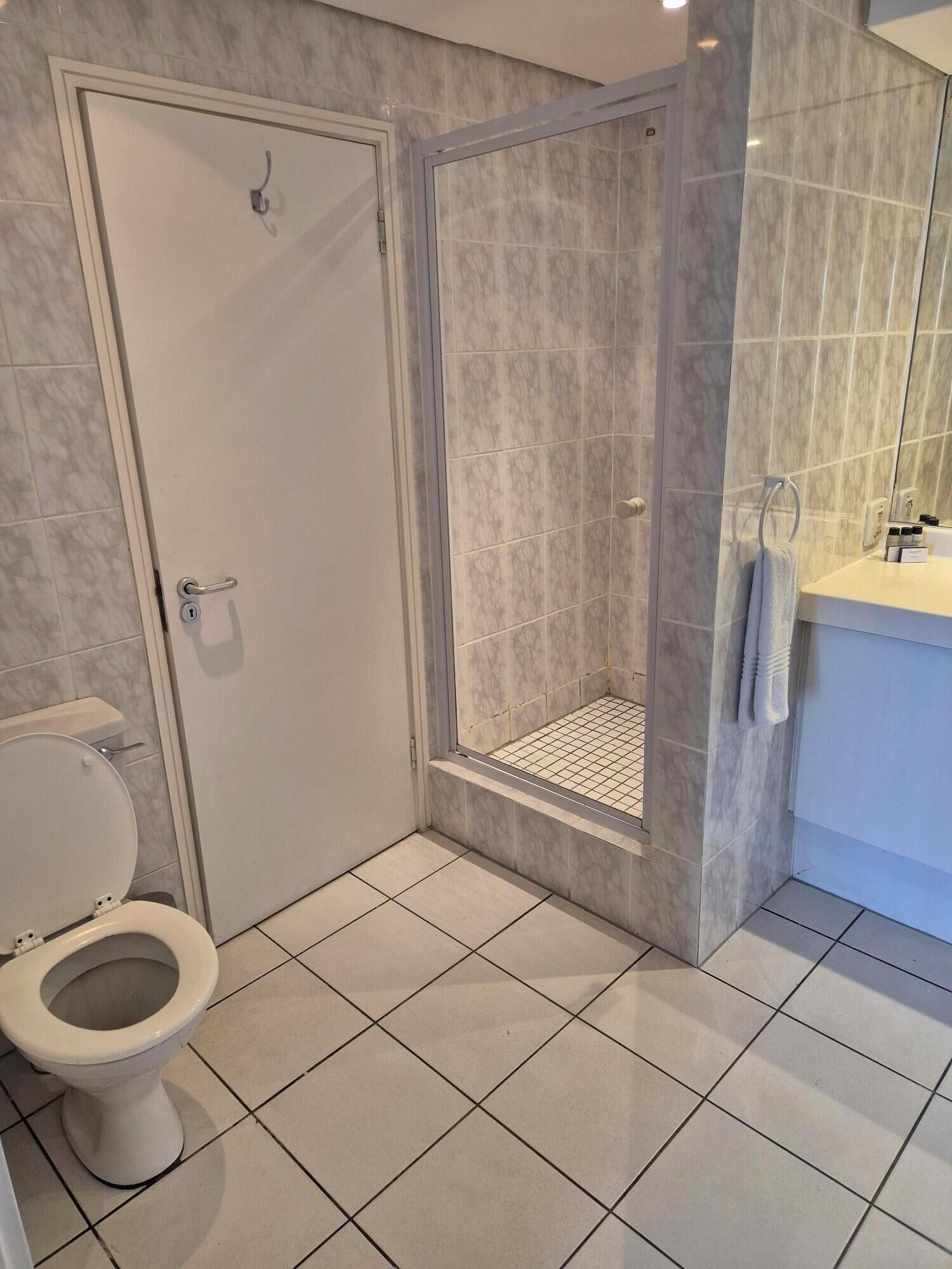 standard studio, 1 queen bed | bathroom | separate bathtub and shower, free toiletries, hair dryer, towels