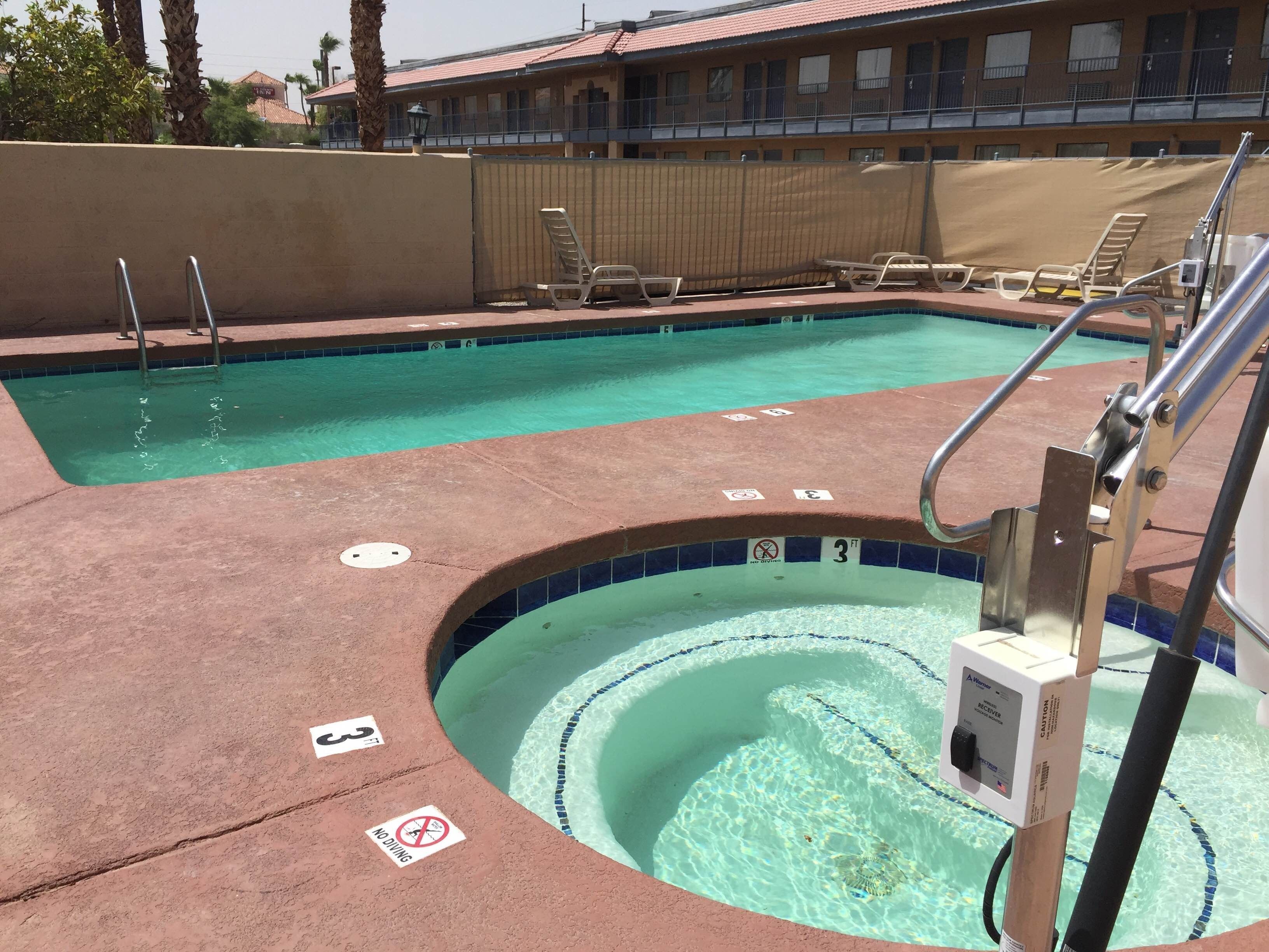 Outdoor pool, open 7:00 AM to 10:00 PM, sun loungers