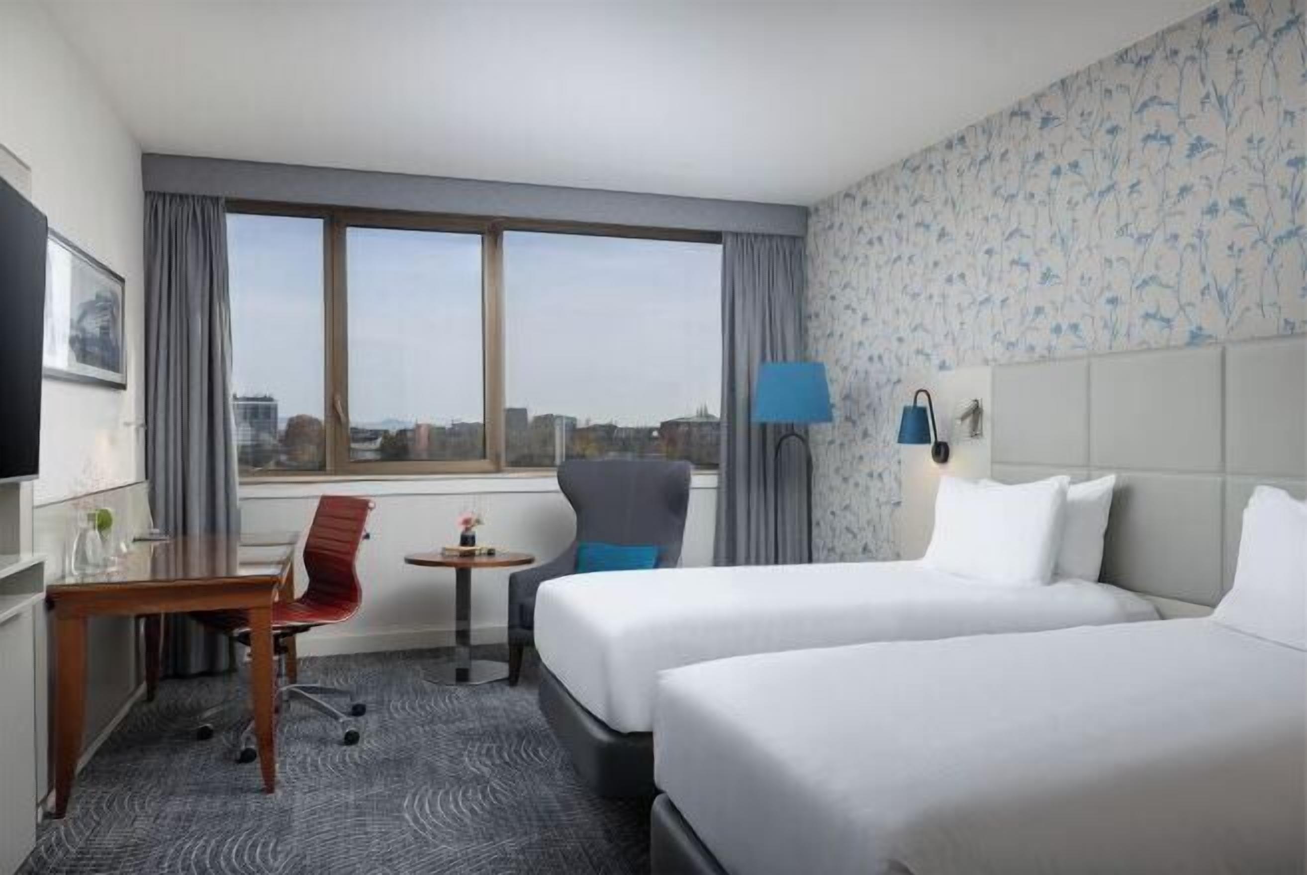 Premium bedding, pillow-top beds, in-room safe, laptop workspace