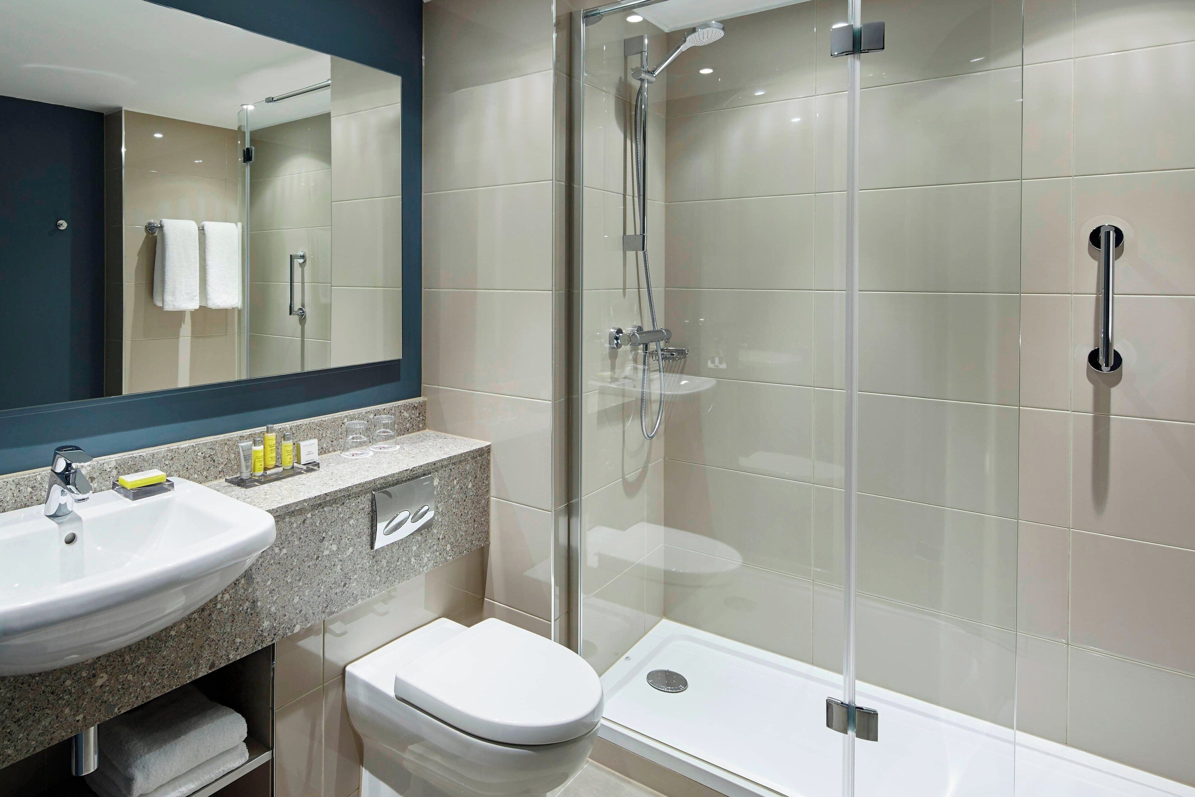 combined shower/bathtub, free toiletries, hair dryer, towels