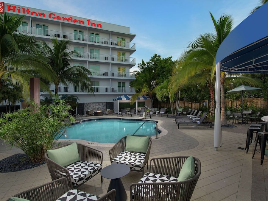 Outdoor pool, open 7:00 AM to 10:00 PM, sun loungers