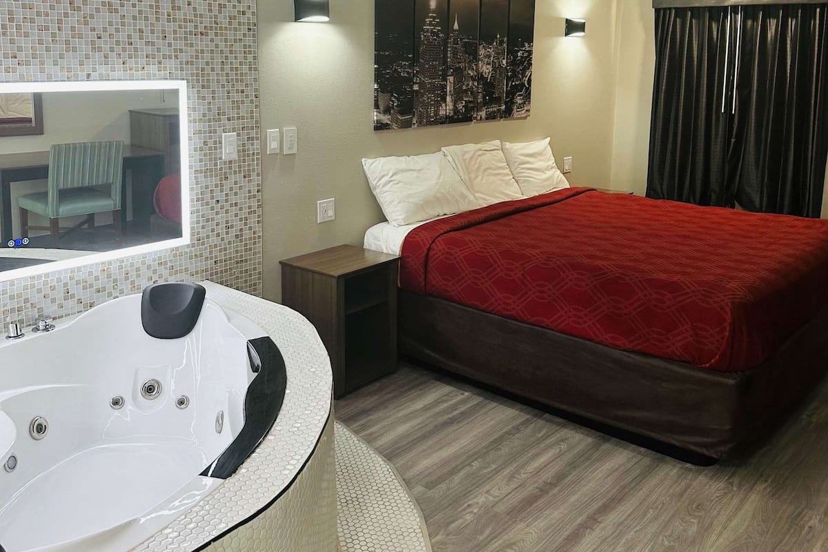 Suite, 1 King Bed, Non Smoking | Desk, laptop workspace, iron/ironing board, free WiFi