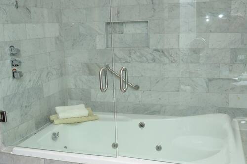 Junior Room | Bathroom | Shower, hair dryer, towels