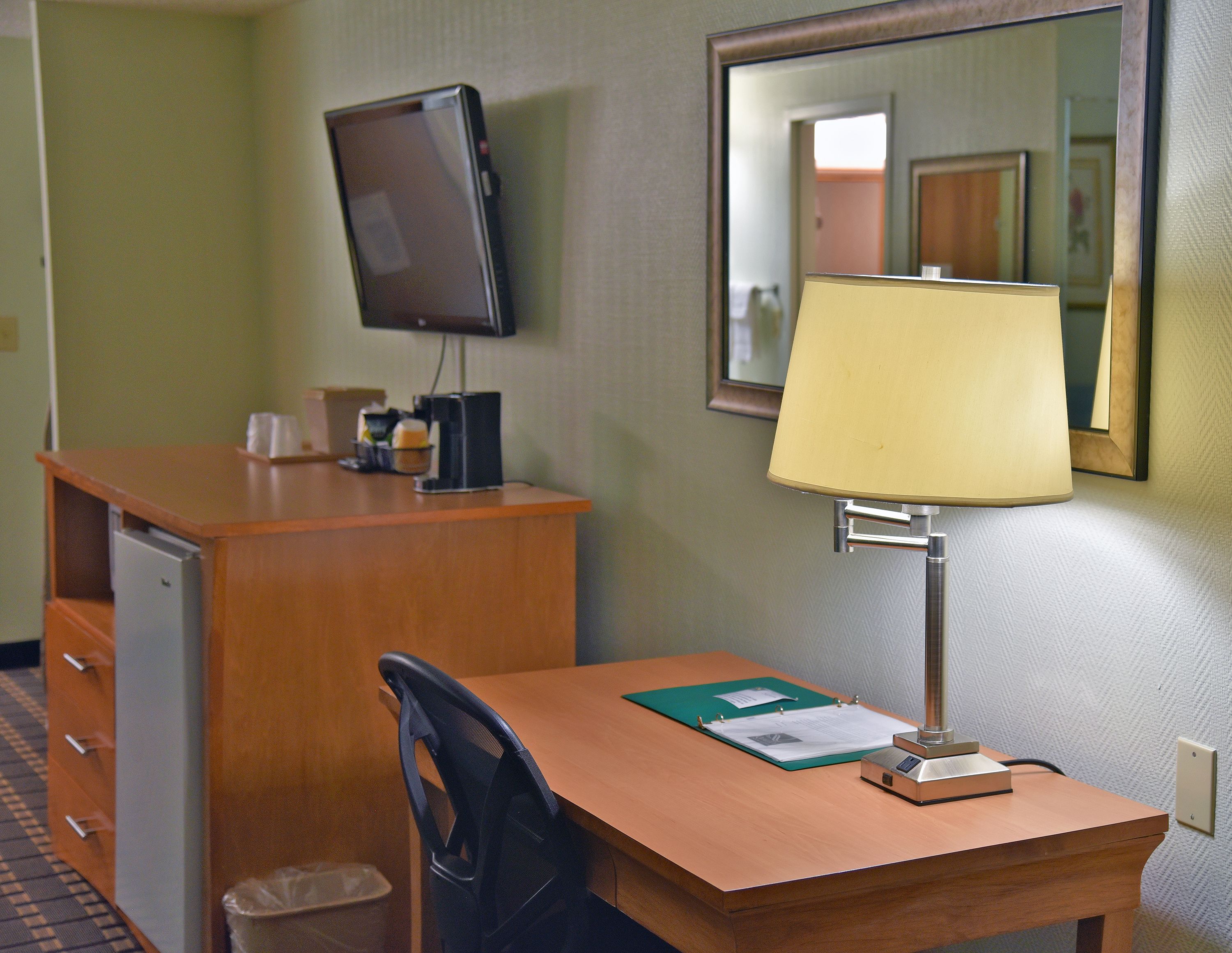 business suite, 1 king bed, non smoking | in-room safe, desk, laptop workspace, iron/ironing board