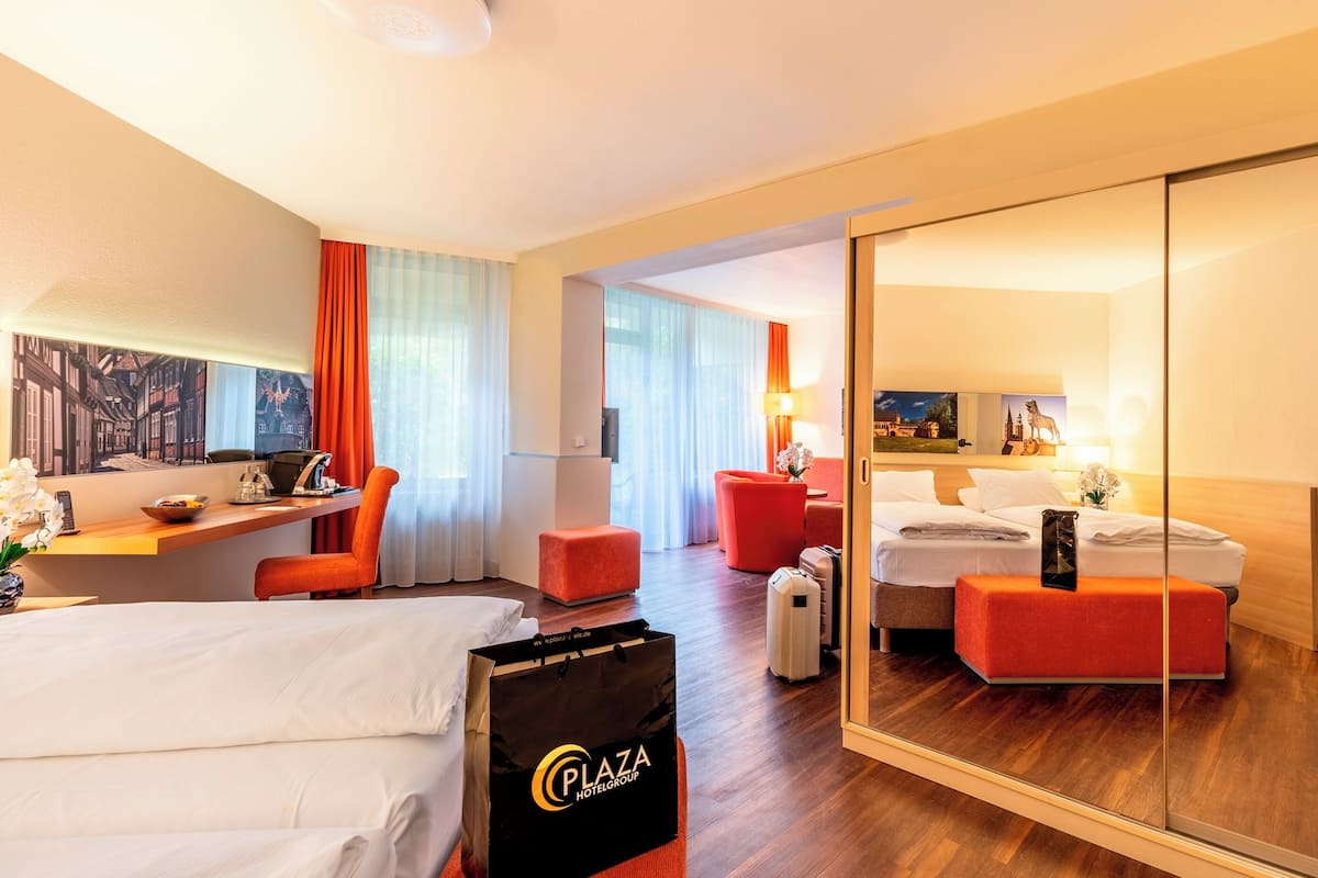 Junior Suite | 1 bedroom, hypo-allergenic bedding, desk, iron/ironing board