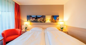 Ropa de cama hipoalergénica, escritorio y tabla de planchar con plancha 