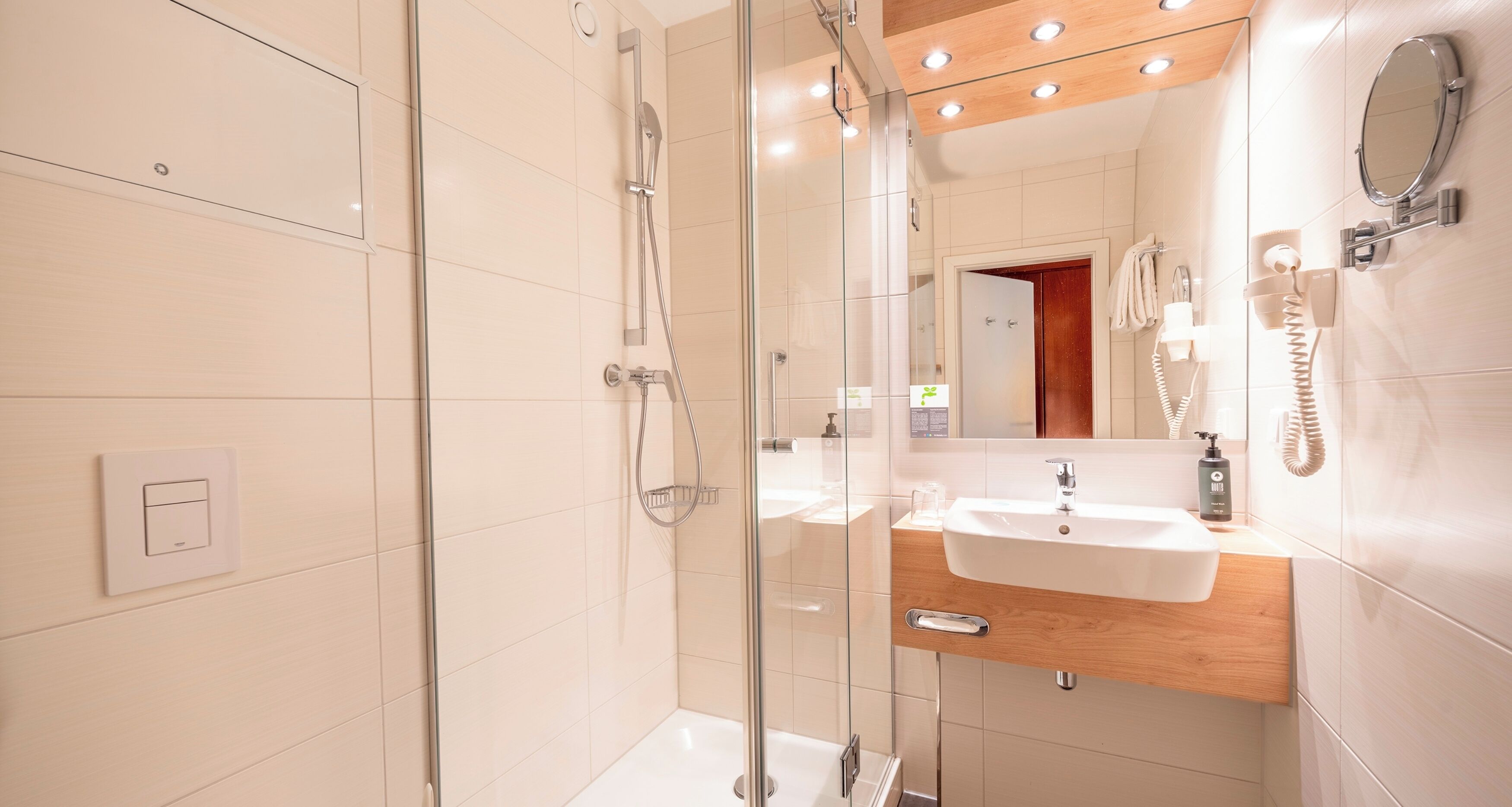 hair dryer, towels, soap, toilet paper