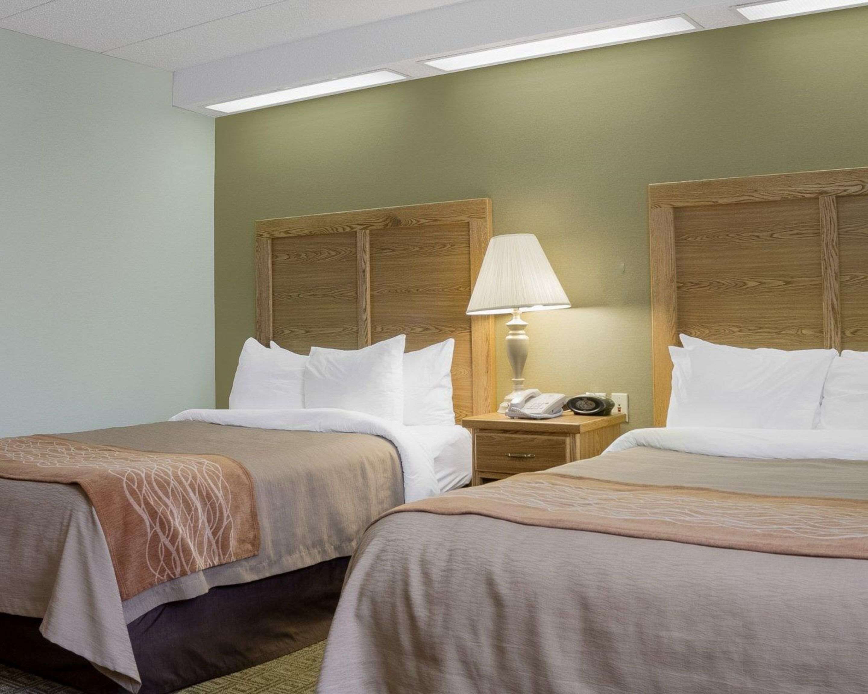 hypo-allergenic bedding, desk, blackout curtains, iron/ironing board