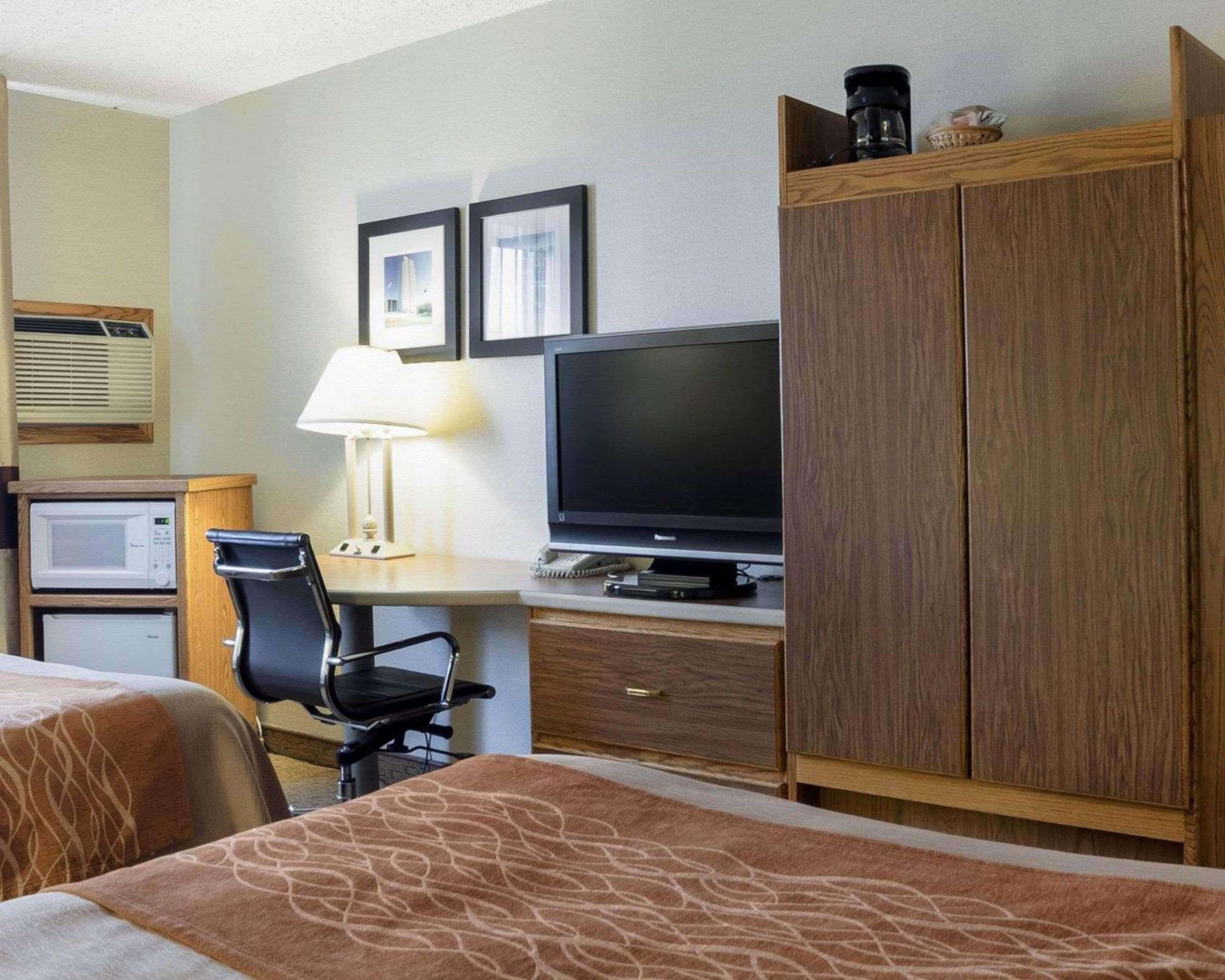 hypo-allergenic bedding, desk, blackout curtains, iron/ironing board