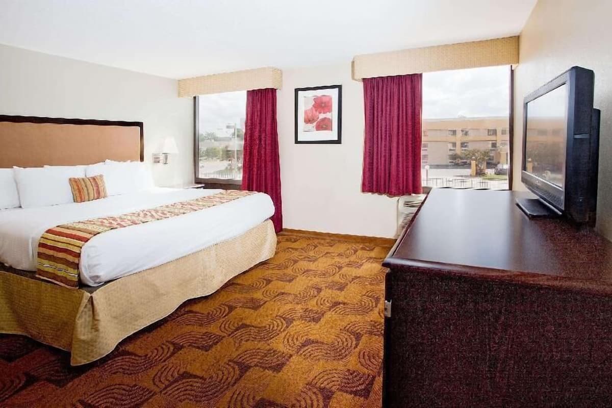 Premium bedding, desk, blackout curtains, iron/ironing board