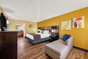 Desk, laptop workspace, blackout drapes, iron/ironing board