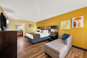 Desk, laptop workspace, blackout drapes, iron/ironing board