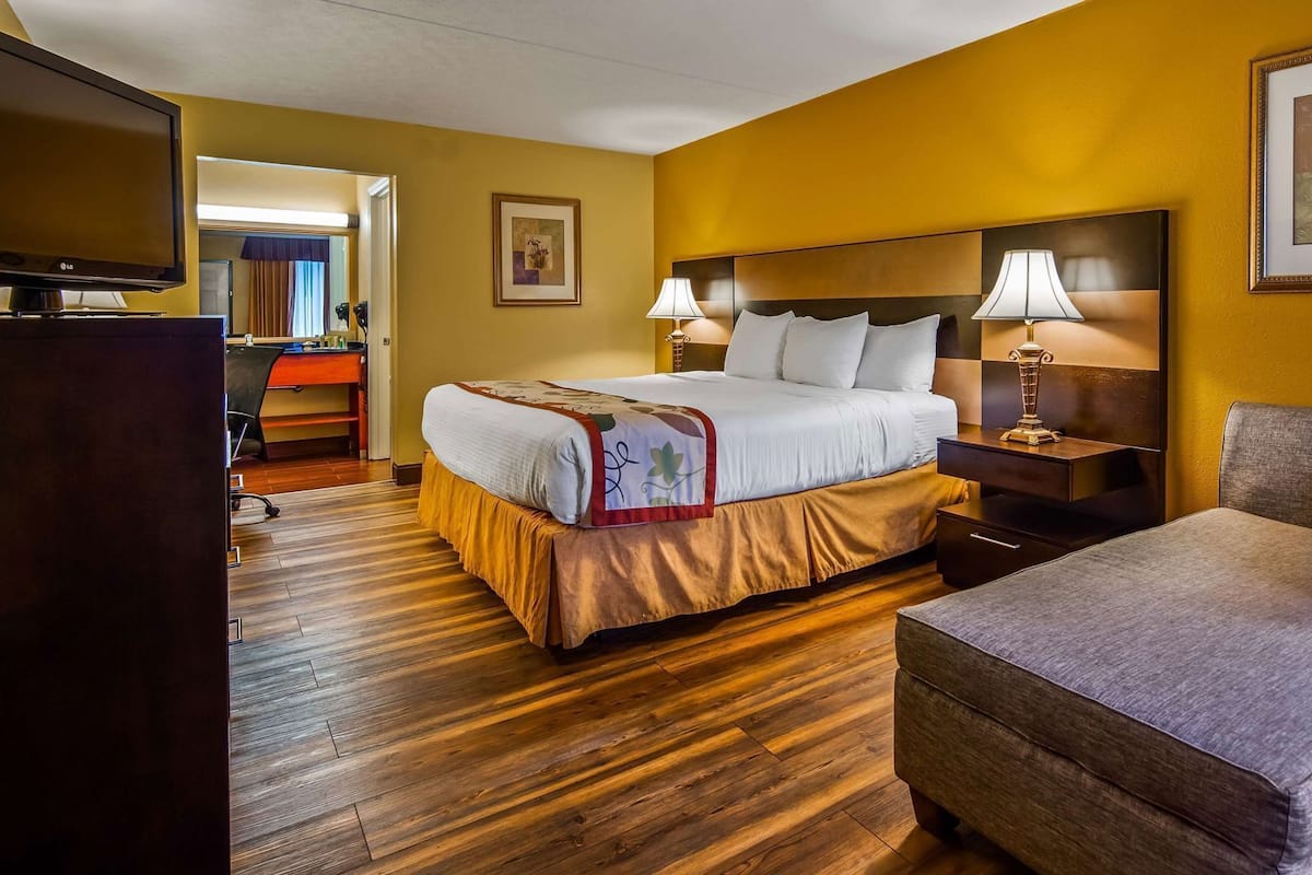 Desk, laptop workspace, blackout curtains, iron/ironing board