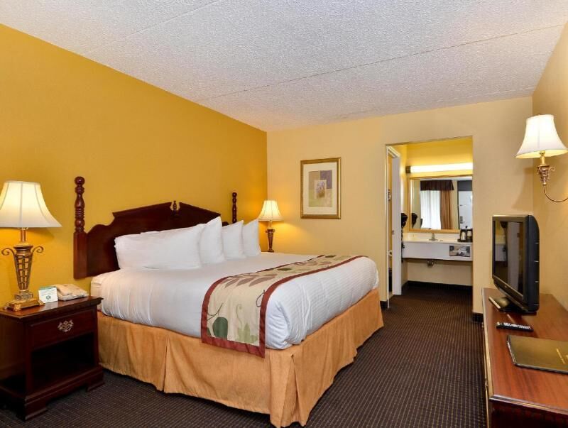 Desk, laptop workspace, blackout curtains, iron/ironing board