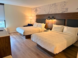 Premium bedding, down comforters, in-room safe, desk