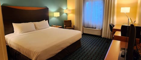 Room, 1 King Bed, Non Smoking | Individually decorated, individually furnished, desk, iron/ironing board