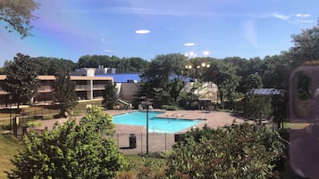 Seasonal outdoor pool, pool loungers