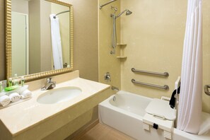 Combined shower/bathtub, hair dryer, towels, soap