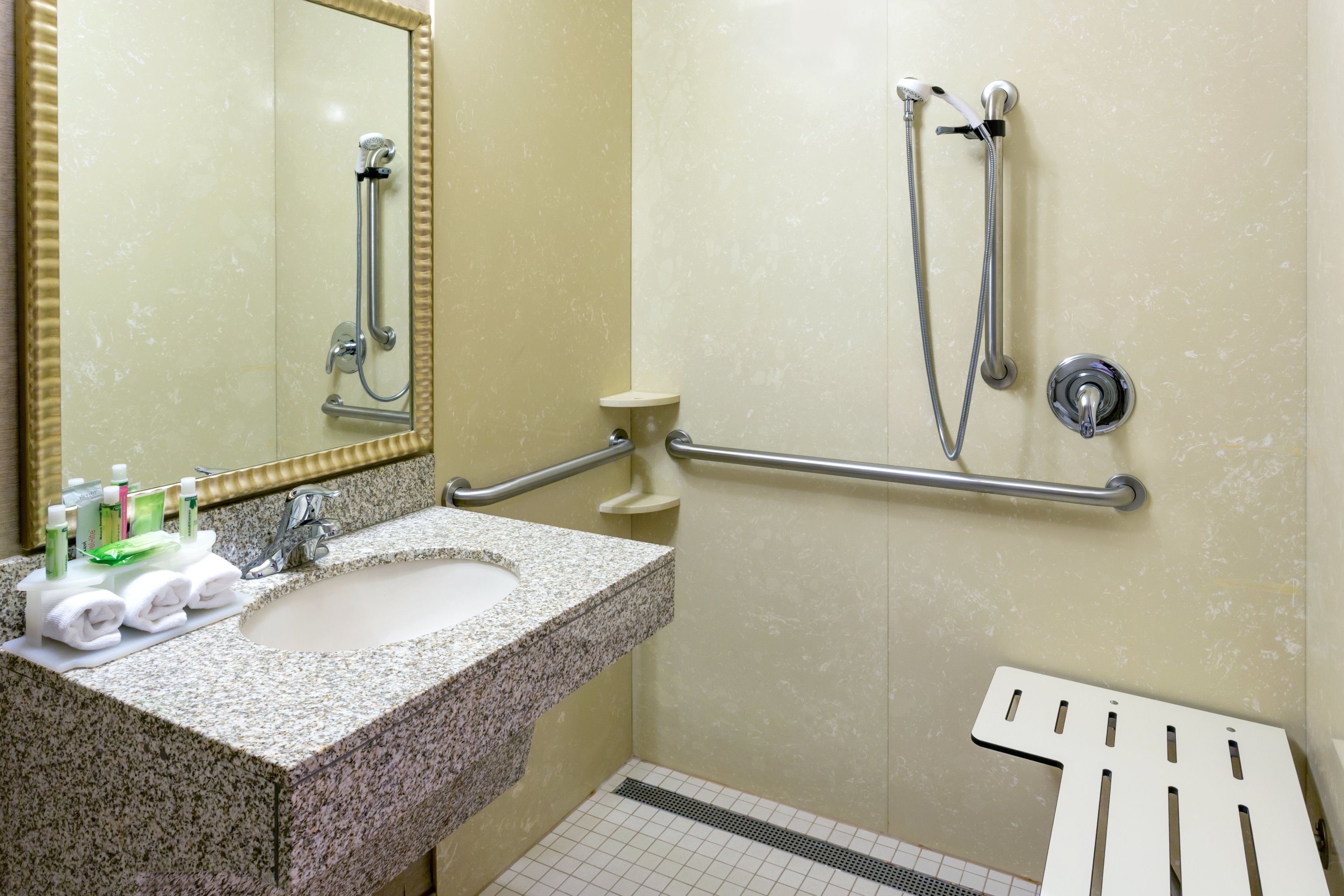 combined shower/bathtub, hair dryer, towels, soap