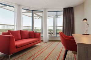 Superior Suite, 1 King Bed, Non Smoking | Down comforters, in-room safe, desk, laptop workspace