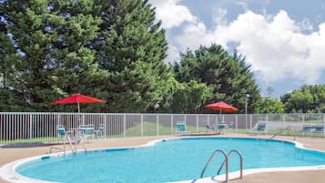 Seasonal outdoor pool, open 10:00 AM to 8:30 PM, pool umbrellas