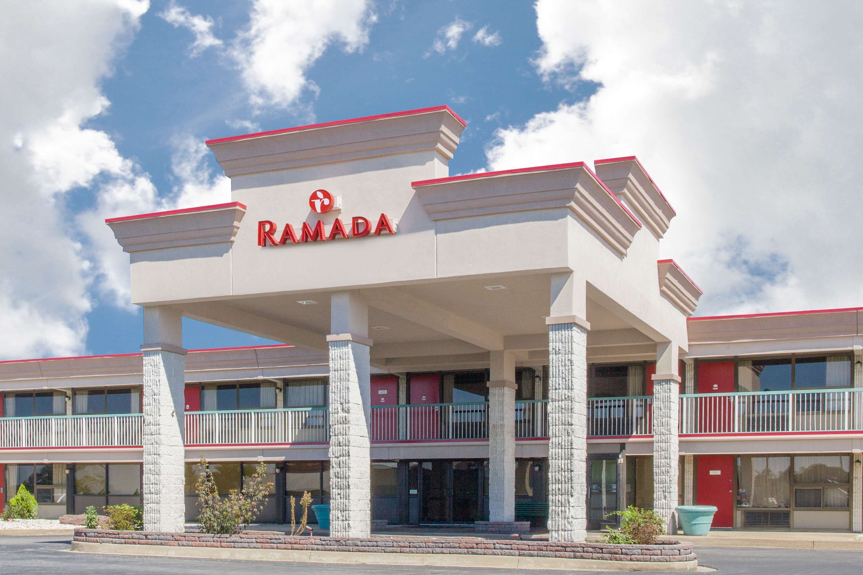 A multi-story building with a prominent 'RAMADA' sign.