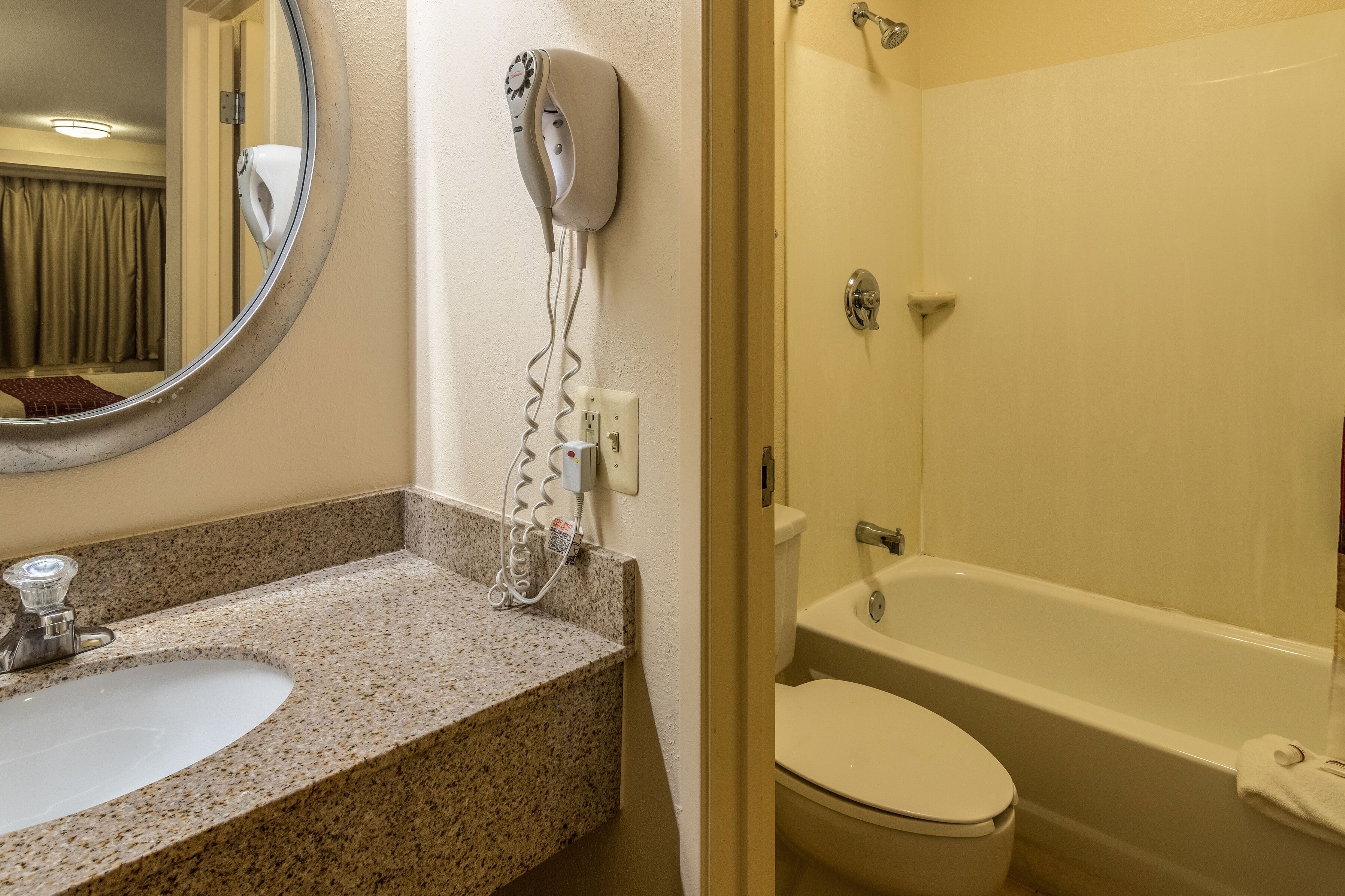 Combined shower/tub, deep soaking tub, free toiletries, hair dryer