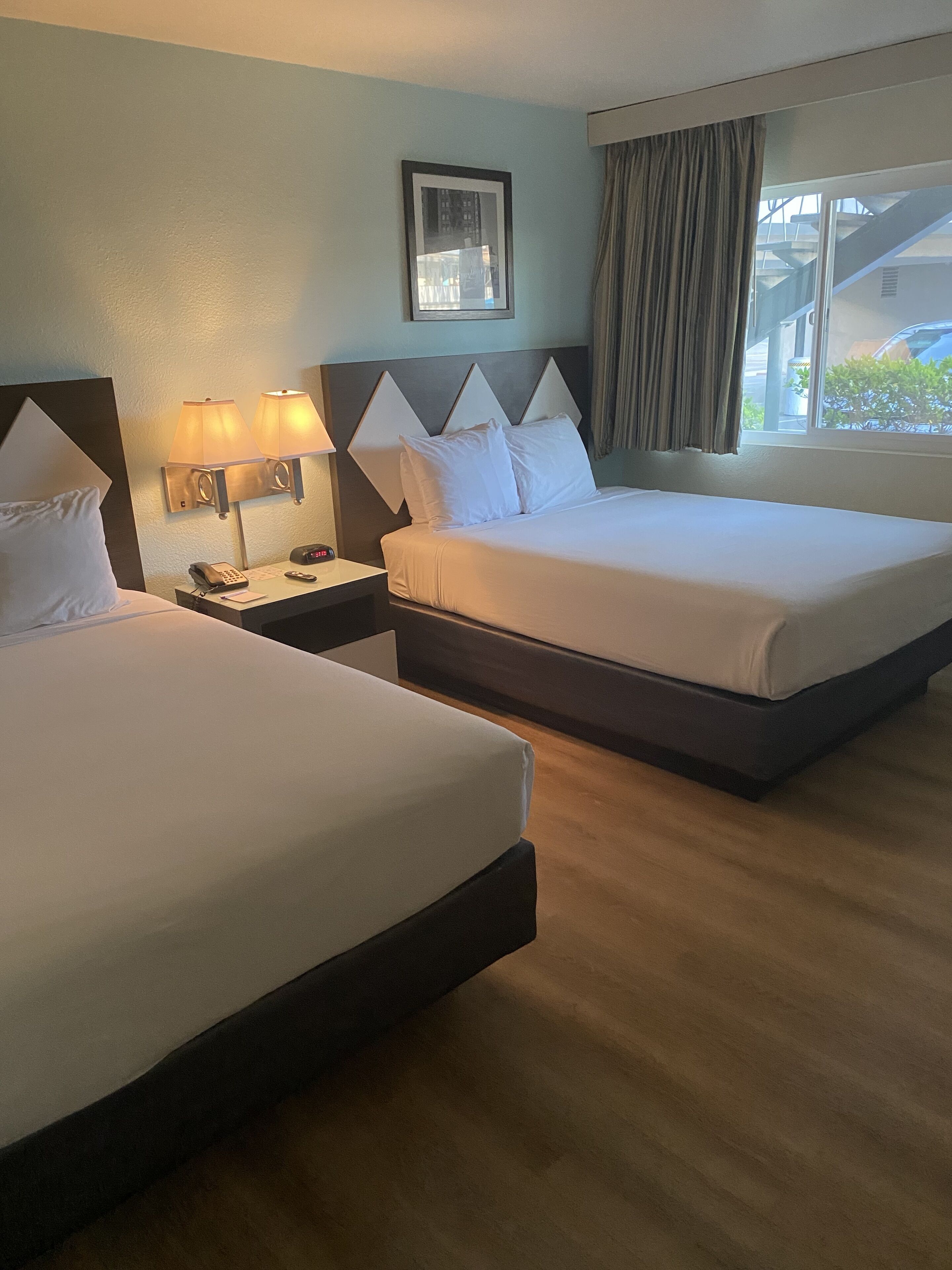 Standard Room, 2 Queen Beds | In-room safe, blackout curtains, iron/ironing board, free WiFi