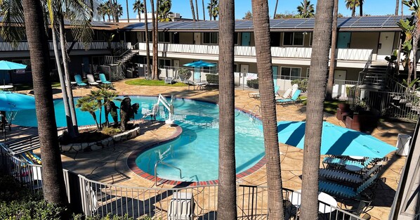 Outdoor pool, open 8:00 AM to 10:00 PM, pool umbrellas, sun loungers