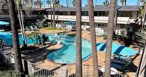 Outdoor pool, open 8:00 AM to 10:00 PM, pool umbrellas, sun loungers