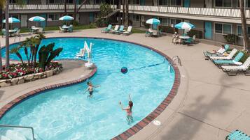Outdoor pool, open 8:00 AM to 10:00 PM, pool umbrellas, sun loungers
