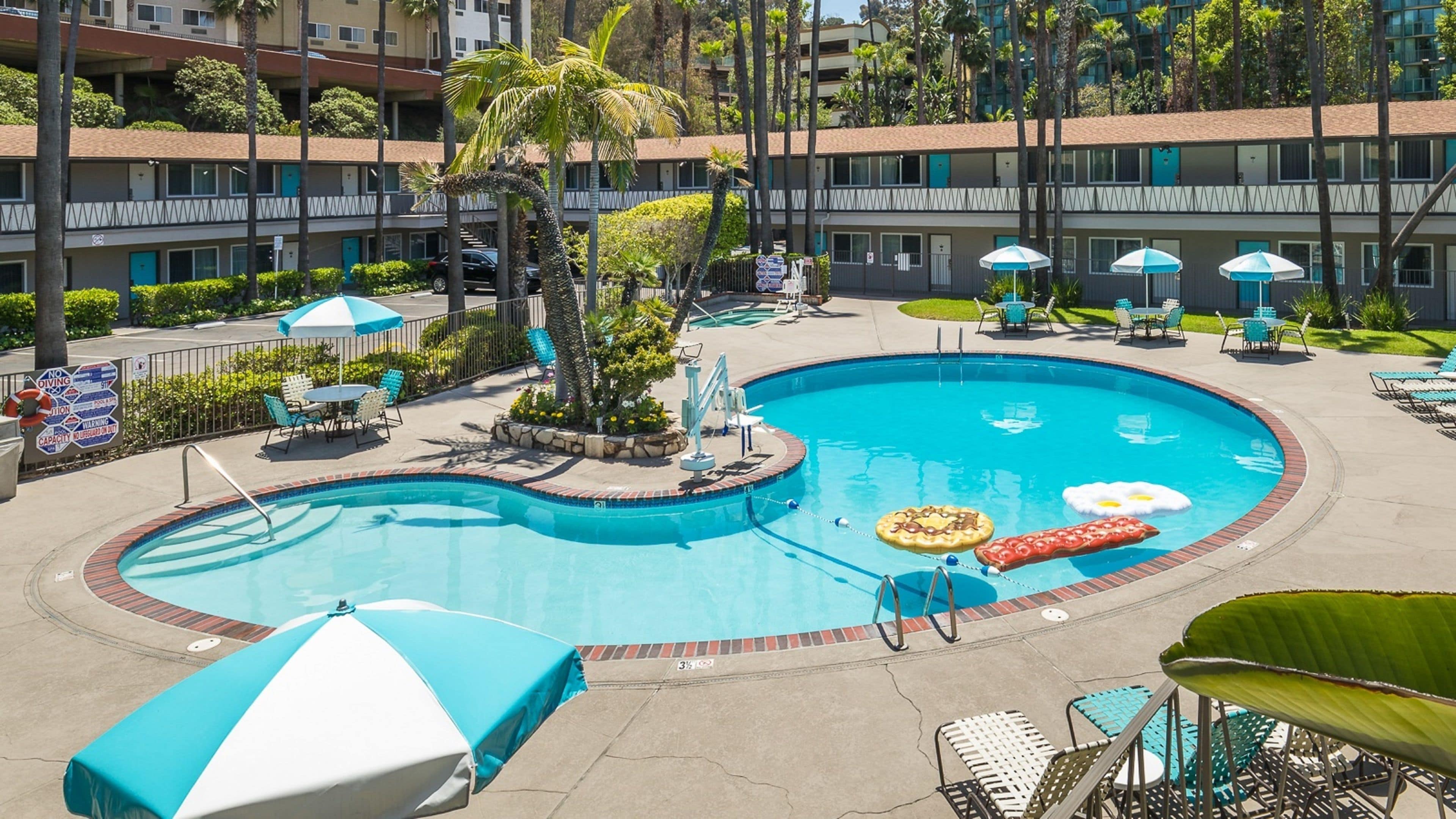 Outdoor pool, open 8:00 AM to 10:00 PM, pool umbrellas, sun loungers